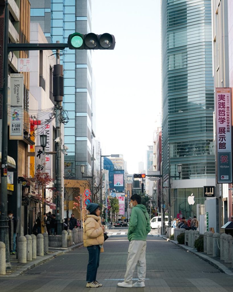 Vibrant street scene capturing daily life in Japan with urban architecture.